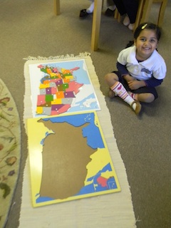 Primary student working with US puzzle map.